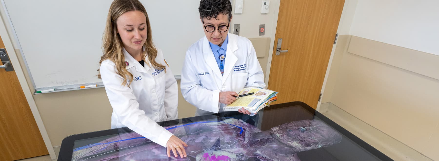 Casey Marie Boothe, SCGSHS student with Norma B. Ojeda, Professor and Chair of the Department of Advanced Biomedical Education